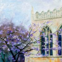 Peterborough cathedral with purple blossom